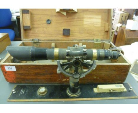 A Keuffet & Esser Co (New York) black lacquered steel and brass periscope level, No.83239, in a fitted light oak carrying cas