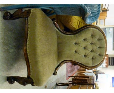 A mid Victorian lady's mahogany showwood framed, spoonback chair, part button upholstered in mid brown dralon, the serpentine