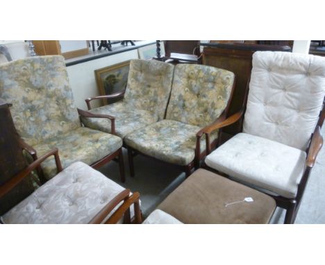 A Parker Knoll stained beech framed four piece suite, each having a high back, raised on turned legs  comprising a pair of ar