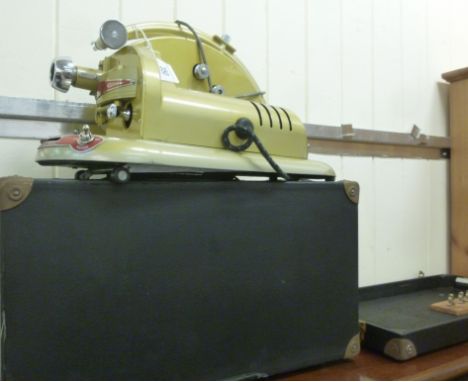 A GEM Pathscope, cine projector, in a fitted black canvas bound case        CA