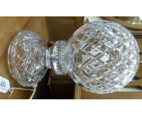 A Waterford crystal two part table lamp with slice decoration, comprising a spherical shade, on a bulbous base  12''h        