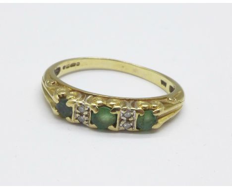 A 9ct gold, emerald and diamond ring, 1.8g, K 