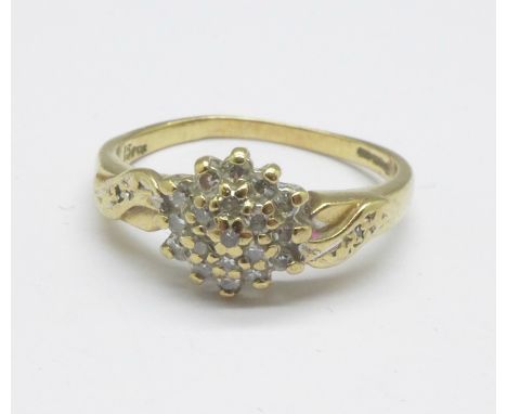 A 9ct gold diamond cluster ring, 1.9g, K 