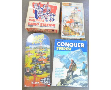 A Dan Dare Space Control radio station, a Conquer Everest board game, an Airfix HMS Prince model kit and a Grand Prix bagatel