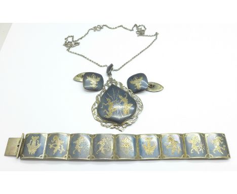 A Siam silver bracelet, pendant and cufflinks 