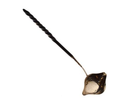 19th Century unmarked white metal toddy ladle, the bowl with double lip, typical twist handle   Condition: 