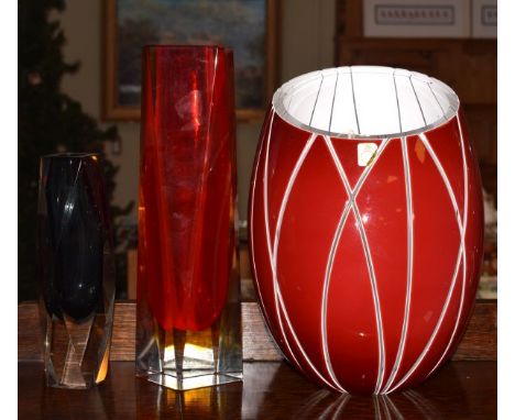 German red and white glass vase together with two cased glass vases   Condition: 