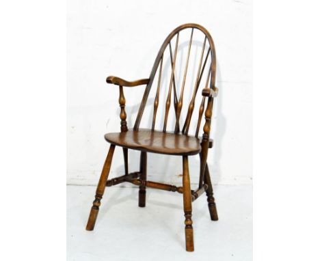 Early 20th Century elm and beech stick back Windsor elbow chair standing on splayed turned supports united by stretchers   Co