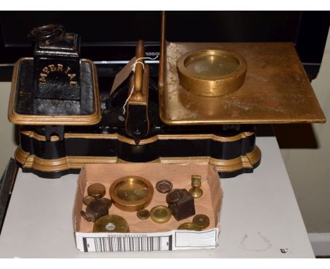 Large set of vintage cast iron balance scales having a brass platform and with various brass and other weights   Condition: 