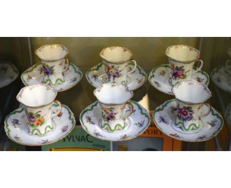 Set of six 20th Century Dresden cabinet cups and saucers, each having foliate decoration   Condition: 