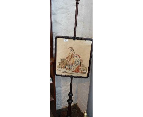 19th c. rosewood pole screen with tapestry panel of two ladies in carved frame above turned column on trefoil platform base