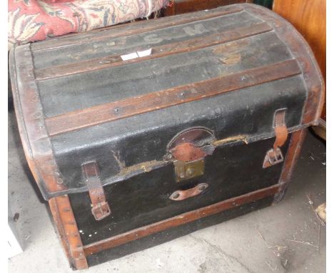 Victorian dome topped leather covered trunk, wood slats and brass lock