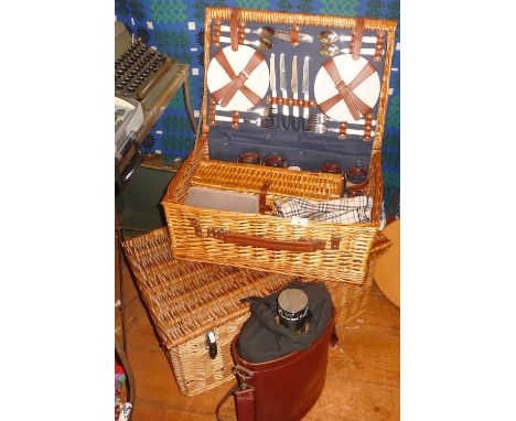 Fitted wicker picnic basket, another wickerwork basket and a family size 'Growler' flask in leather case