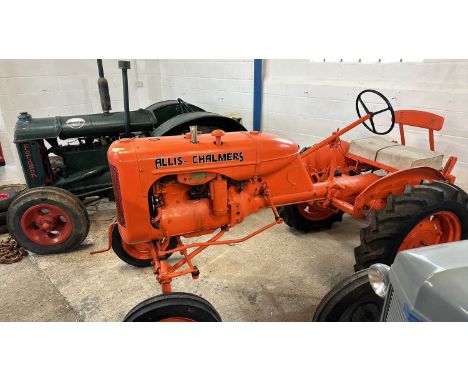 An Allis-Chalmers Tractor, fully restored condition, advised by vendor running, driving when last used