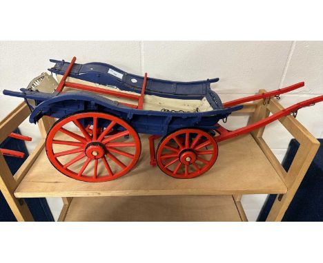 A scratch built model of a Glamorgan Shear Wagon painted in blue, red and black, 77cm long in total