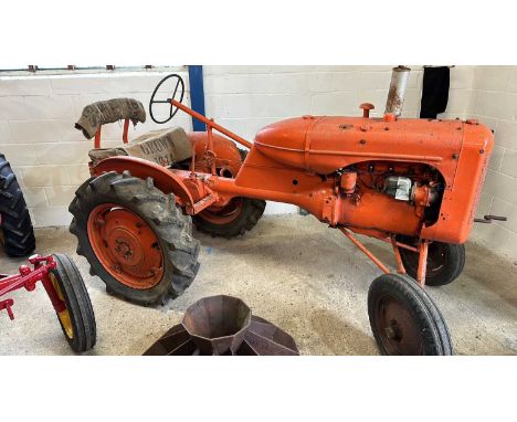 An Allis-Chalmers vintage Tractor, appears subject to a prior restoration but now ready for some further tin work etc