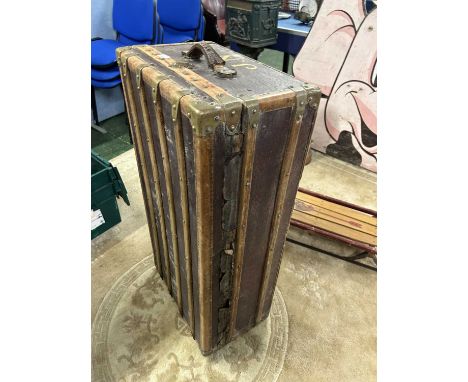 Vintage wooden bound travel trunk