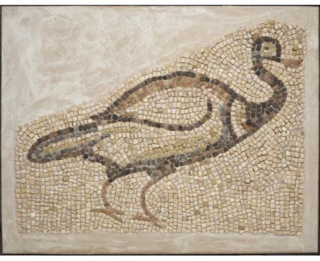  A Late Roman marble mosaic panel Circa 4th-6th Century A.D.Depicting a bird, probably a duck, composed of white, green, brow