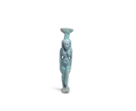  An Egyptian pale blue faience amulet of Nephthys Late Period-Ptolemaic Period, circa 664-30 B.C.The goddess depicted wearing