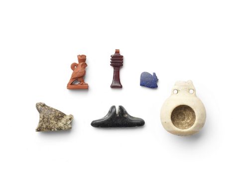  Four Egyptian hardstone amulets and a miniature alabaster pilgrim flask Third Intermediate Period-Late Period, circa 1069-33