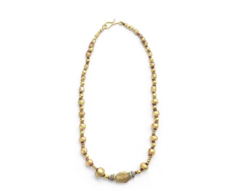  A Roman gilded glass, gold and faience bead necklace Circa 1st Century B.C.–1st Century A.D.Formed of 39 gilded glass cylind