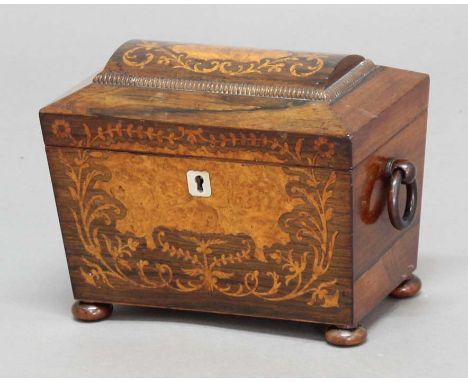 REGENCY ROSEWOOD TEA CADDY, of sarcophagus form with domed top and marquetry inlay, the interior with twin lidded canisters, 