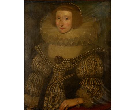 FOLLOWER OF MARCUS GHEERAERTS THE YOUNGER (1561/2-1636) PORTRAIT OF A LADY Half length, wearing a black and cream dress, pear
