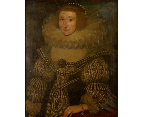 FOLLOWER OF MARCUS GHEERAERTS THE YOUNGER (1561/2-1636) PORTRAIT OF A LADY Half length, wearing a black and cream dress, pear