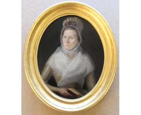 CIRCLE OF JOHANN ZOFFANY (1733-1810) PORTRAIT OF A LADY Half length, wearing a grey dress, white shawl and lace bonnet, holdi