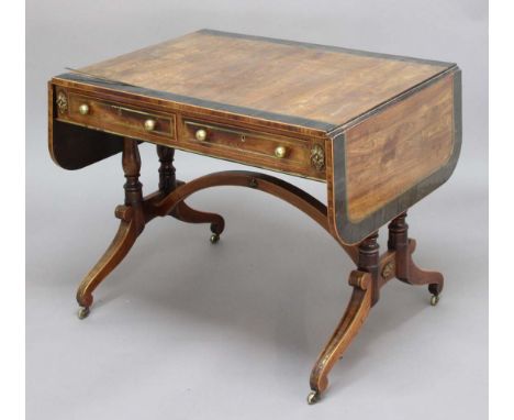 REGENCY SOFA TABLE, probably figured mahogany, ebony and brass banded, the rounded rectangular top above two true and false d