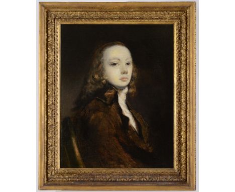 STUDIO OF SIR JOSHUA REYNOLDS, PRA (1723-1792) PORTRAIT OF A YOUNG GENTLEMAN Quarter length seated, wearing a brown coat and 