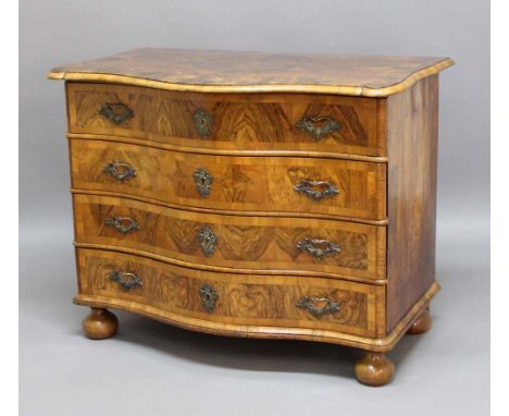 FRENCH WALNUT SERPENTINE COMMODE, the crossbanded top above four ling drawers, on bun feet, height 92cm, width 120cm, depth 6