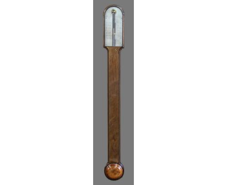 REGENCY STYLE MAHOGANY STICK BAROMETER, the silvered gauge inscibed Wm. Ridgy, Sherborne, above a slender trunk and circular 