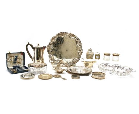A collection of silver and silver plated items. The silver items include a William Comyns and Sons tea caddy, London, 1891, A