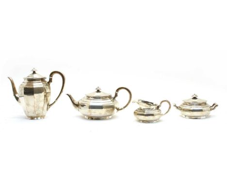 A Continental silver five piece tea service, comprising tray, tea pot, hot water jug, sucrier and milk jug, of decagonal form