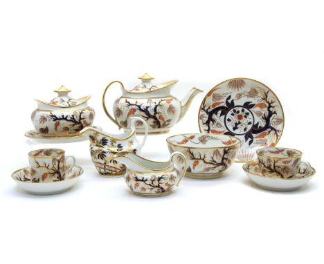 A New hall porcelain part tea service, having painted enamel and gilt floral decoration, comprisign teapot, cover and stand, 