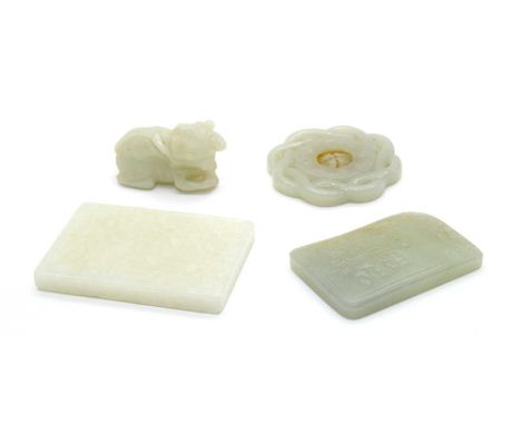 Two Jade rectangular pendants, with boys and inscriptions or nipples, a pierced disc and a kylin, 4 to 6.8cm (4)