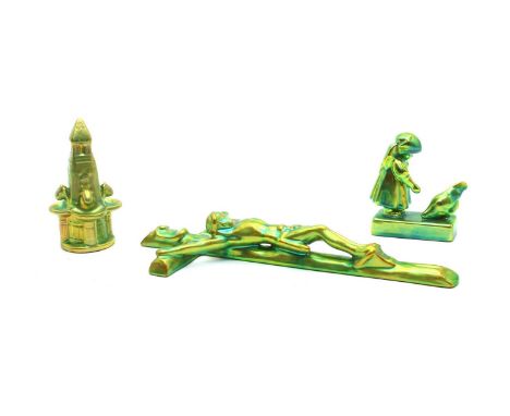 A Zsolnay Pecs Eosin crucifix, 33cm high, together with a figure depicting a girl with chicken, 11cm high, and a spire form f