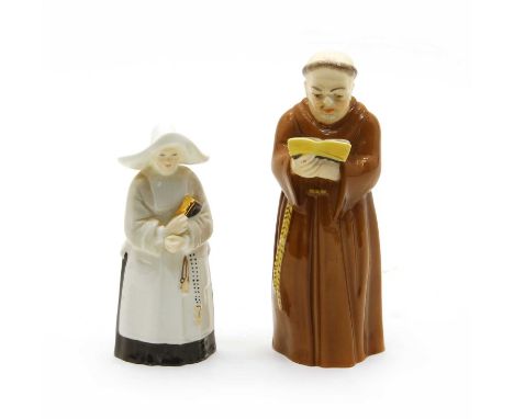 Two Royal Worcester porcelain snuffers, the first as a monk, initialled 'KC', 12.5cm high, the second a nun, initialled 'JW' 