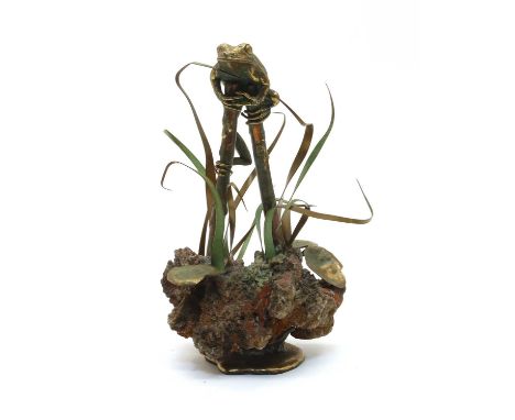 A mid 20th century San-Francisco bronze sculpture of a frog perched on two bamboo poles, with naturalistic base beneath, 23cm