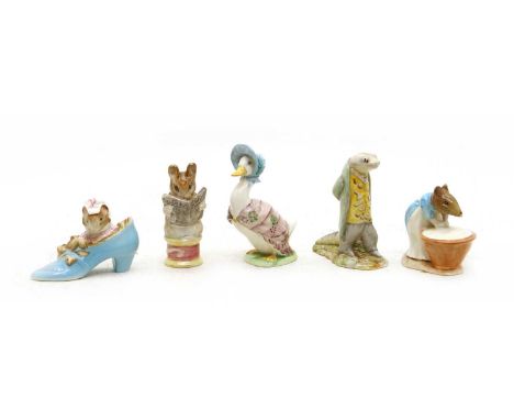 Eleven Beswick Beatrix Potter figures, to include 'Squirrel Nutkin', 'Sir Isaac Newton' and 'Jemima Puddleduck', all with bro