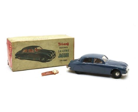 A Triang electric 2.4 Litre Jaguar, 1/20 scale, in original boxCondition report: Steering wheel and dashboard looseScratches 