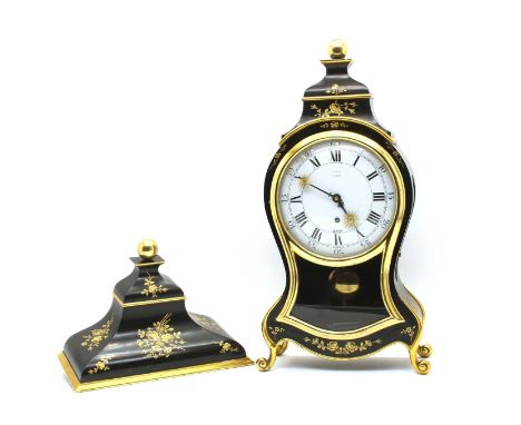 A lacquered bracket clock by Zenith, 20th century, the enamel dial set with Roman numerals, the case with a gilt floral decor