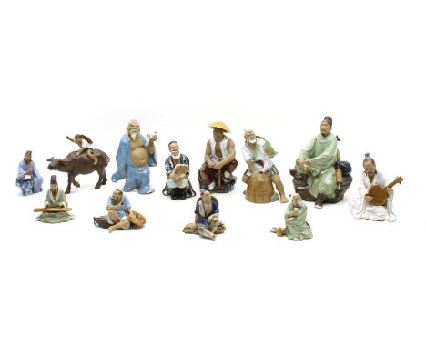A large collection of Chinese ceramic figures, depicting men in various poses (21)Condition report: Fisherman's fish is broke