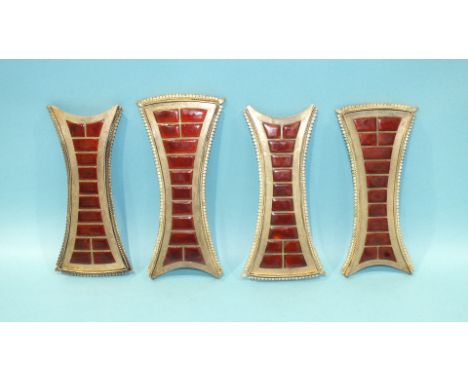A set of four white metal and red enamel mounts, possibly for a mirror, each 14cm long.