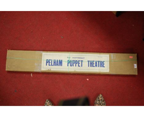 A boxed The Lightweight Pelham Puppet Theatre