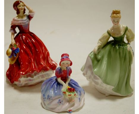 A Paragon figurine 'Spring' A55; together with a Royal Doulton figure 'My Fair Lady' HN2193; and a Royal Doulton figure 'Moni