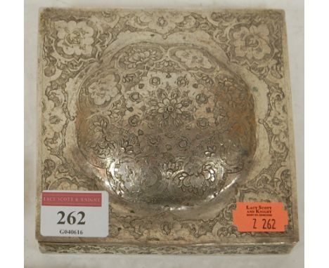 An early 20th century continental white metal trinket jar of square form, having hinged dome cover with all-over foliate engr