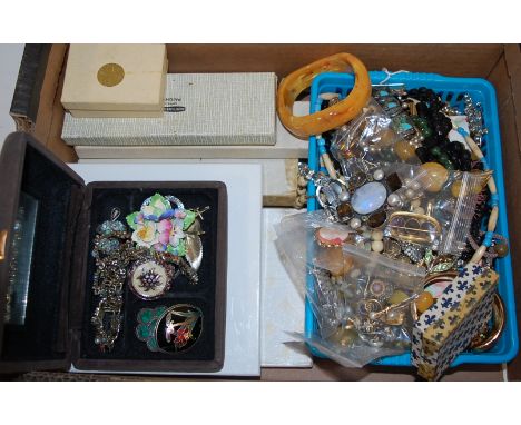 A large collection of assorted costume and other jewellery to include; faux amber bangle, gold plated locket, pinchbeck and a