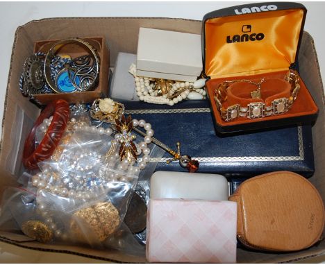 A box of assorted costume jewellery to include; faux pearl necklace, niello bangle, brooches etc 